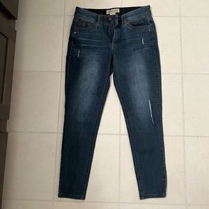 Ankle skinny jeans with distressed marks